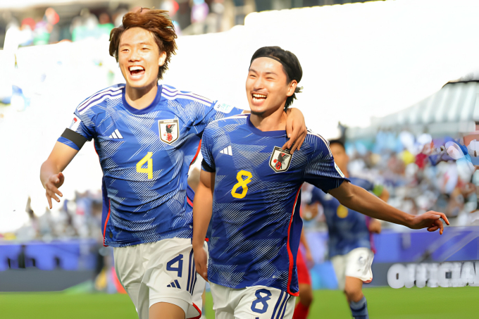 Minamino (số 8) ghi 2 bàn cho Nhật Bản. Ảnh: Getty