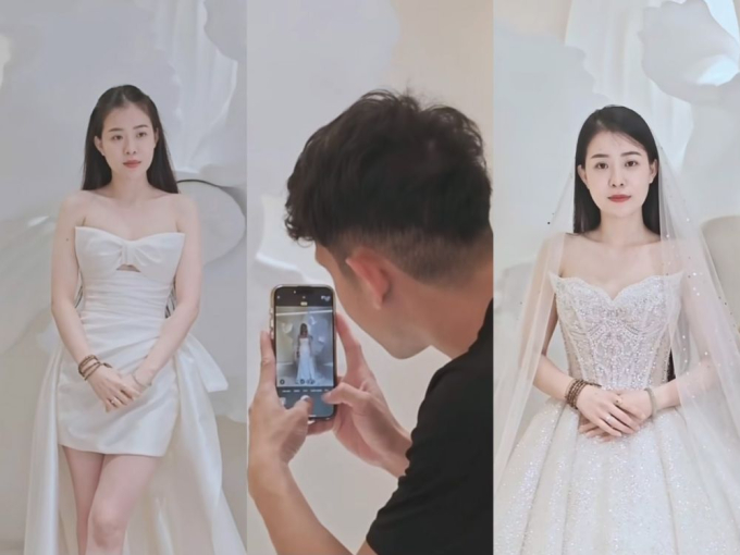 Hồng Duy chụp ảnh cho vợ khi đi thử váy cưới 
