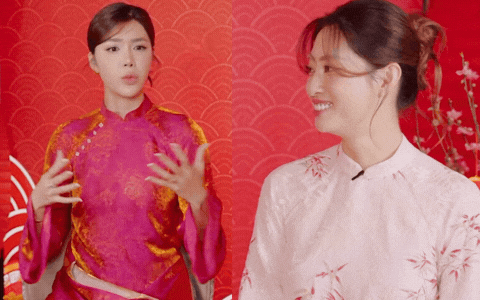 Biểu cảm gượng gạo của Lương Thuỳ Linh sau câu nói của Minh Tú (Ảnh: FBNV)