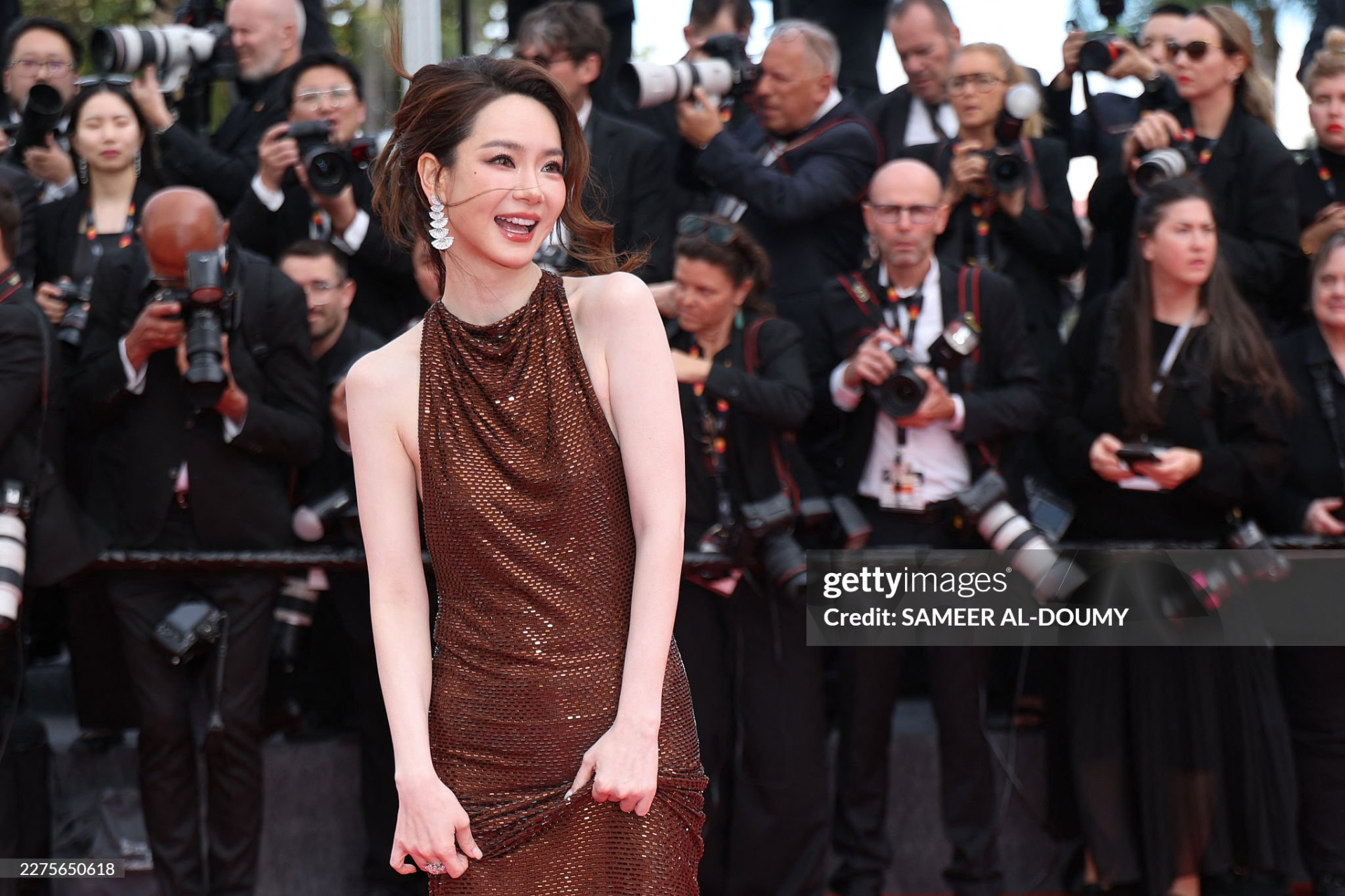 Nụ cười của nữ ca sĩ làm bừng sáng khung hình. Ảnh: Getty Images