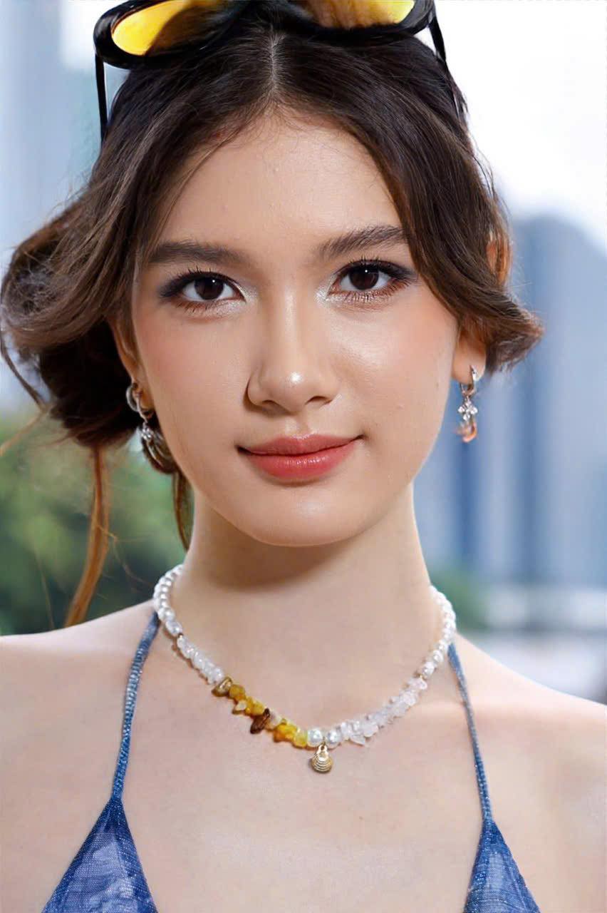 Thanh Giang làm mẫu ảnh.