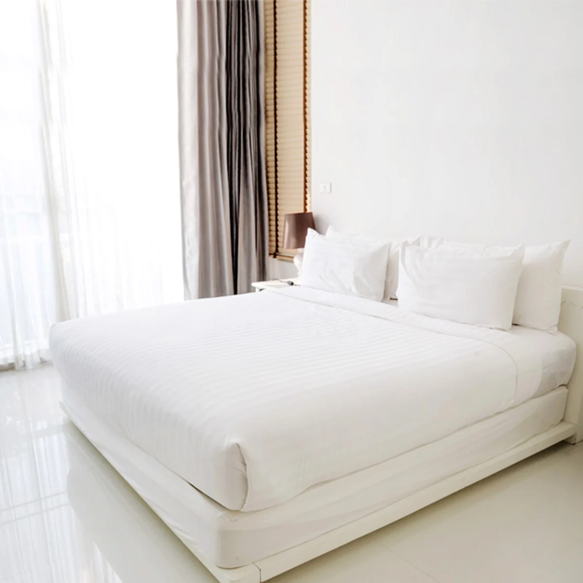 Vì sao ga giường khách sạn luôn màu trắng?