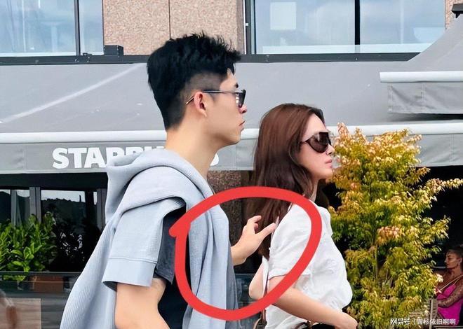 Cách Trương Hướng Vinh quan tâm bà xã Dương Thái Ngọc được nhận xét là giống với cách 1 người chồng đang chăm lo cho vợ bầu. Ảnh: 163