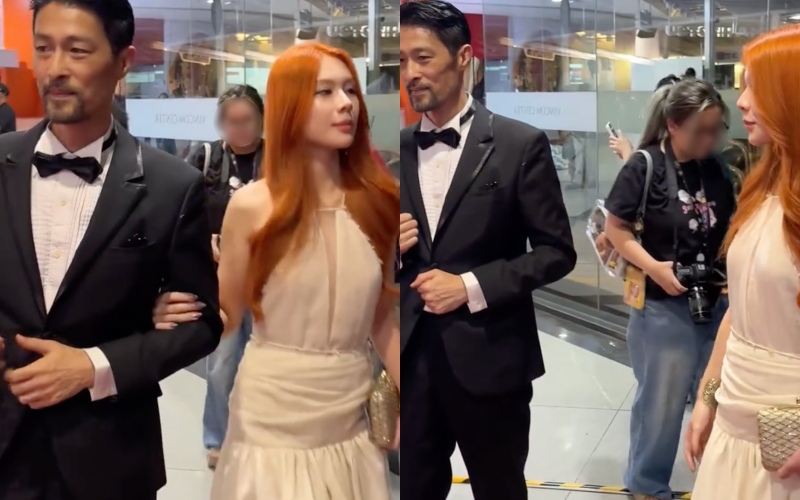 Ban đầu cặp đôi khoác tay nhưng Kalli Nguyễn đã chủ động né ra để Johnny Trí Nguyễn chụp ảnh với fan (Ảnh cắt từ clip/ Đi Soi Sao Đi)