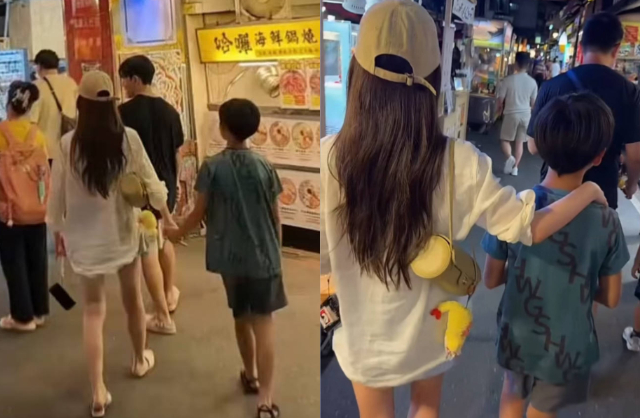 Mandy và con trai riêng của chồng thân thiết. Bé Uông Hy Lâm thoải mái nắm tay, trò chuyện với mẹ kế. Ảnh: Sina.