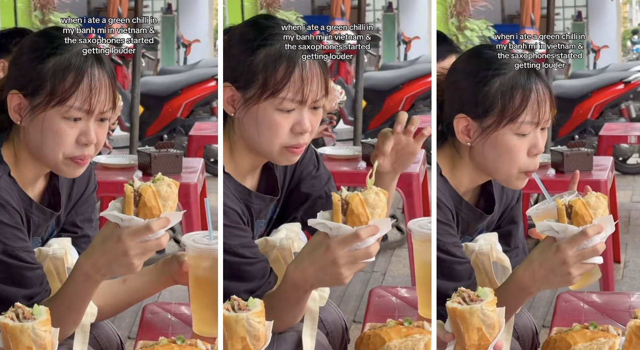 Một cô gái nước ngoài sau khi vô tình cắn phải ớt xanh trong bánh mì đã nhăn nhó và phải uống nước lập tức cho đỡ cay. Nguồn: Natterz