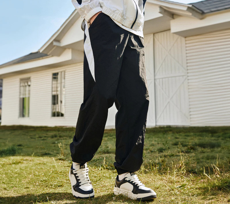 Quần dài thể thao nam Anta.