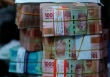 Đồng Rupiah của Indonesia bắt đầu sụp đổ trước đồng USD