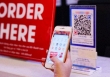 Cảnh báo chiêu lừa đảo mới: Dán đè mã QR giả mạo tại các cửa hàng