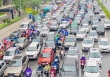 Đầu tuần dân công sở Hà Nội khổ sở vượt mưa gió, ùn tắc kéo dài