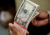 Giá USD phục hồi trên thị trường thế giới