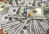 Đồng USD giảm nhẹ nhưng vẫn ở mức cao