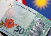 Malaysia rơi vào tình trạng 'quốc hội treo' khiến thị trường chứng khoán và tiền tệ suy giảm