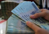 Nhiều người lao động chuẩn bị tinh thần tiền thưởng Tết sẽ giảm