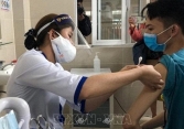 Tiếp tục đàm phán để đảm bảo có vaccine phòng COVID-19 bao phủ toàn dân nhanh nhất