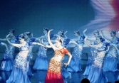 Dung mạo bất phàm của trưởng đoàn ca múa Evergrande, ông chủ Hứa Gia Ấn từng khen: 'Thiếu cô ấy việc không thể thành'