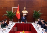 Thủ tướng họp khẩn về Covid-19 tại phòng họp ở Đại hội XIII