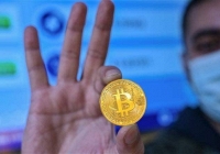 Bitcoin tăng nhẹ lên vùng 58.000 USD