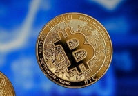Bitcoin tăng nhẹ, thị trường tiền ảo khởi sắc