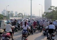 Thu phí kiểm định khí thải xe máy: Phí chồng phí?