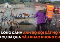 Ấm lòng cảnh anh bộ đội dắt hộ xe đạp, dìu cụ bà qua cầu phao Phong Châu