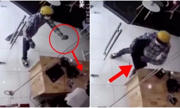 Tên cướp dùng xịt hơi cay tấn công nhân viên lấy laptop ở Bình Dương