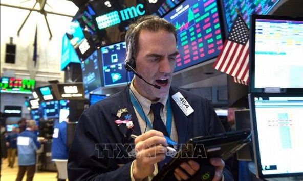 Chứng khoán Mỹ tăng vọt nhờ lãi suất ổn định