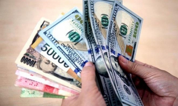 Đồng USD giảm nhẹ sau khi đạt mức cao nhất trong 16 tháng qua