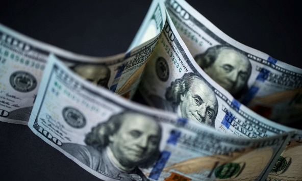 Đồng USD giảm nhẹ, nhà đầu tư thận trọng trước biến chủng Omicron