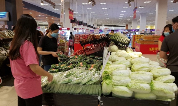 Giá rau củ tại chợ TP.HCM đã 'hạ nhiệt' nhưng vẫn ở mức cao