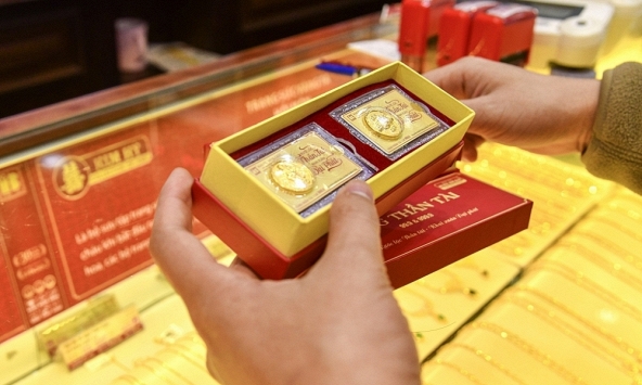 Giá vàng thế giới hạ nhiệt