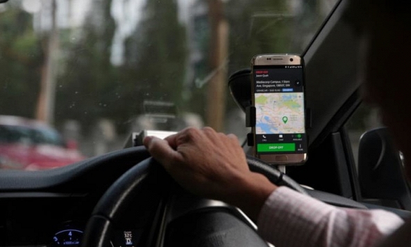 Singapore: Tài xế Grab, Gojek than trời vì giảm thu nhập, Grab cho biết sự sụt giảm là 'theo mùa'