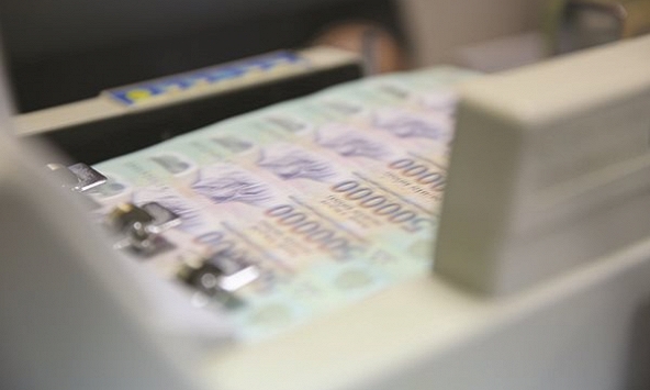 Tiền gửi của người dân vào hệ thống ngân hàng gần như không tăng