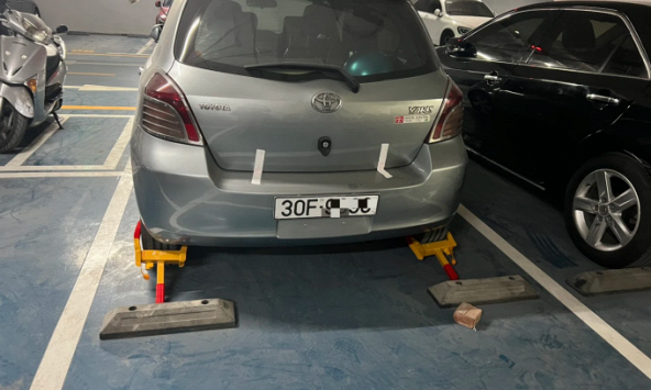 Từ vụ chung cư Artemis: Chủ đầu tư có được quyền khóa bánh, chặn ô tô của cư dân vào hầm để xe?