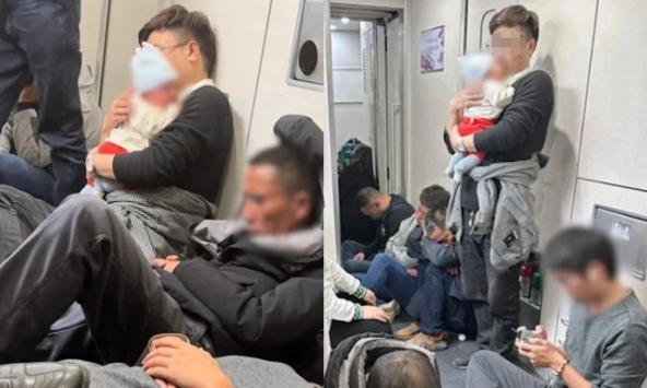 Bố bế con nhỏ trên tay đứng suốt 8 tiếng trên tàu, cảnh tượng đáng được đồng cảm này bị dân mang chỉ trích: 'Tại sao không đi máy bay?'