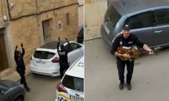 Cảnh sát Tây Ban Nha đàn hát cổ vũ người dân bị phong tỏa vì dịch Covid-19