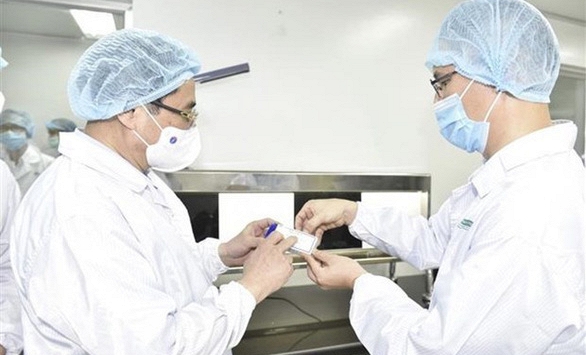 Thủ tướng Phạm Minh Chính: Phải sản xuất bằng được vắc xin COVID-19, chậm nhất là tháng 6-2022
