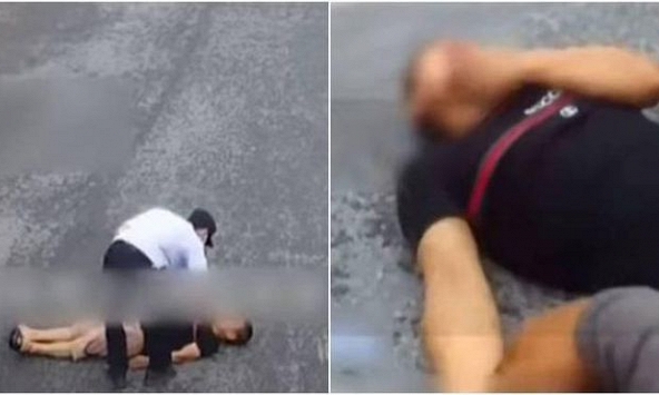 Ông bố nằm dài giữa đường vì bất lực khi con làm sai bài toán