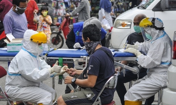 Gần 15 triệu người đã chết vì Covid-19