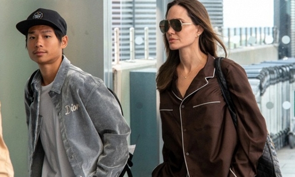 Angelina Jolie mặc đồ ngủ 1.900 USD ra sân bay