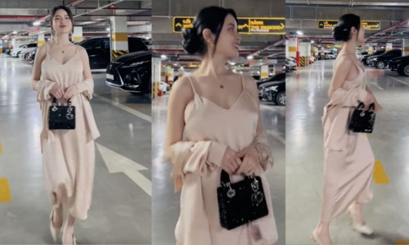Chu Thanh Huyền diện váy sexy, xách túi trăm triệu thả dáng trong hầm xe, gây chú ý với 2 giây hớ hênh khoe vòng một lấp ló