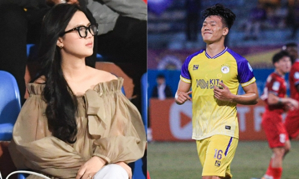 Vợ Thành Chung lộ vai trần trên khán đài sân Hàng Đẫy, chuẩn 'gái một con trông mòn con mắt' 