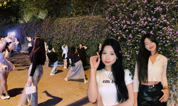 12 giờ đêm hàng chục 'nàng thơ' vẫn chen chân xếp hàng, tìm mọi cách sống ảo với bức tường mới nổi ở Hà Nội