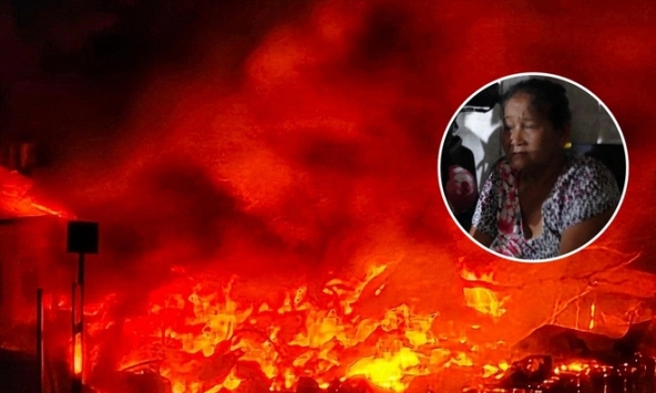 Người dân bàng hoàng khi thoát khỏi đám cháy dãy nhà ven kênh Tàu Hủ