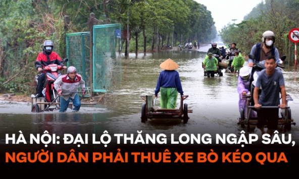 Hà Nội: Ngập sâu trên đại lộ Thăng Long, người dân phải bỏ 50.000 đồng thuê xe bò vượt qua