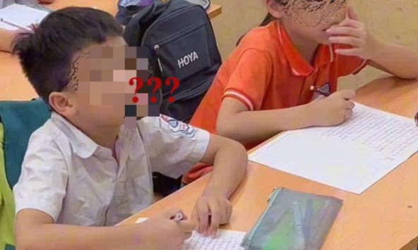 Bức ảnh hai học sinh ngồi học trông rất bình thường, nhìn sang 1 thứ trên mặt nam sinh, dân tình cười rũ rượi: Cô cao tay thật!