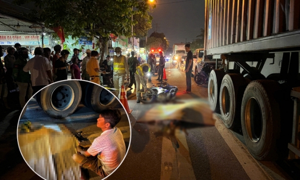 Đến trường đón con đi học về, người phụ nữ bị xe container cán tử vong thương tâm: Người chồng thất thần ngồi bên thi thể vợ