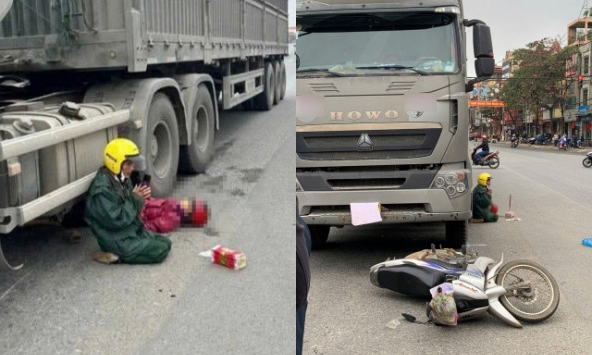 Khoảnh khắc ám ảnh: Người chồng chắp tay, quỳ lạy bên thi thể vợ dưới gầm xe đầu kéo sau va chạm khiến nhiều người nghẹn lòng