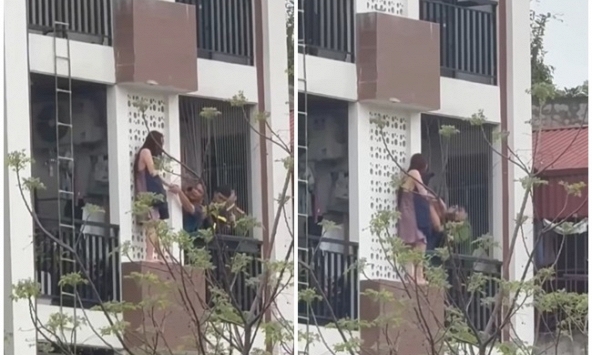 Cô gái trèo ra ngoài tầng cao ngôi nhà, nghĩ quẩn vì giận dỗi người yêu