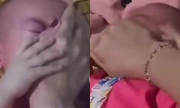 Bé gái giãy giụa do bị người phụ nữ bóp chặt mũi, miệng: Danh tính bất ngờ